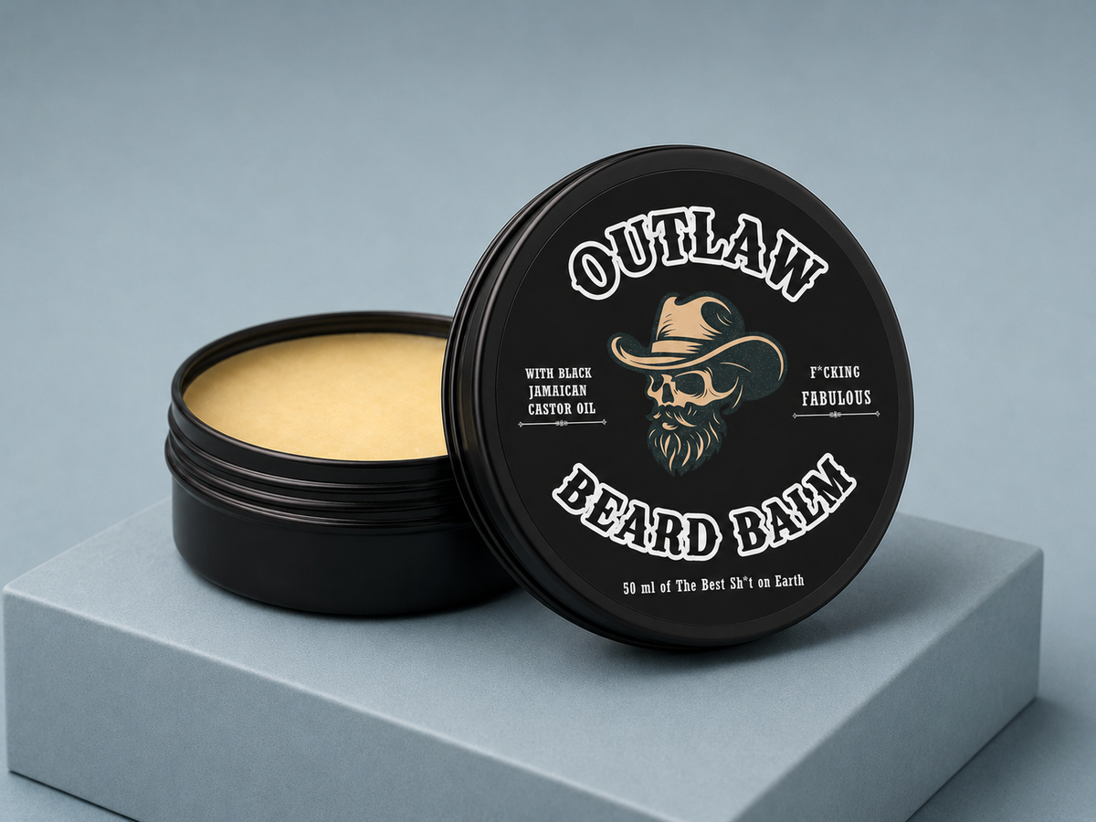 Outlaw Beard Balm jar with open lid on a gray background